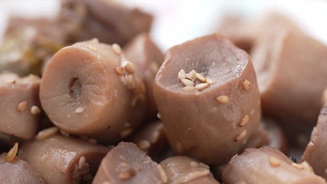 Deliciously braised mushroom in soy sauce garnished with sesame seeds