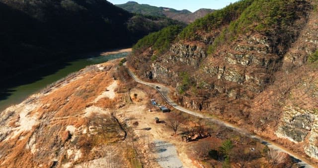 Serene River Winding Through Autumn Valley
