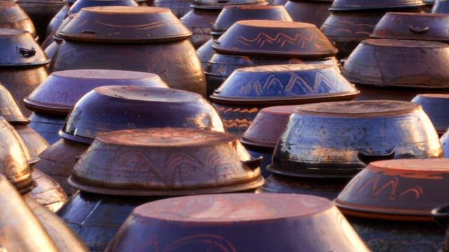 Traditional clay storage jars on a jangdokdae