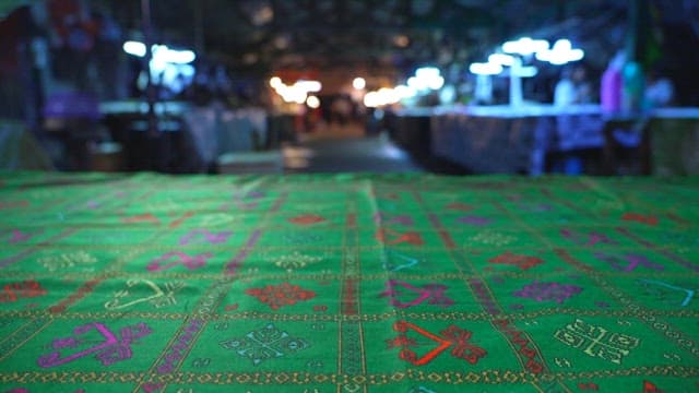 Plate of pig trotters and julienne Korean radish salad served on a market table