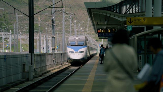 High-speed train arriving at the station platform