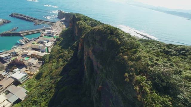 Coastal cliffs and clear blue sea