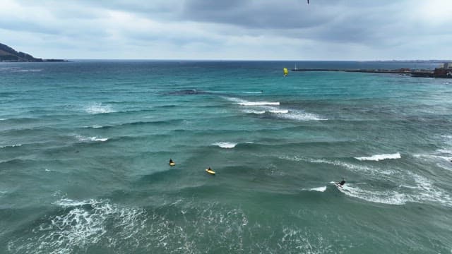 People surfing on the ocean waves