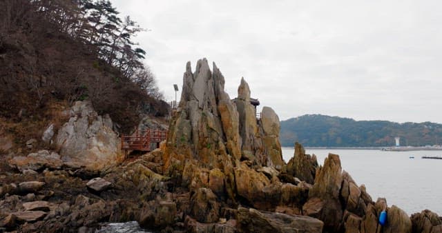 Coastal Walkway with Rocky Peaks