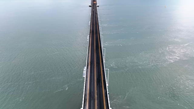 Long bridge stretching over the sea