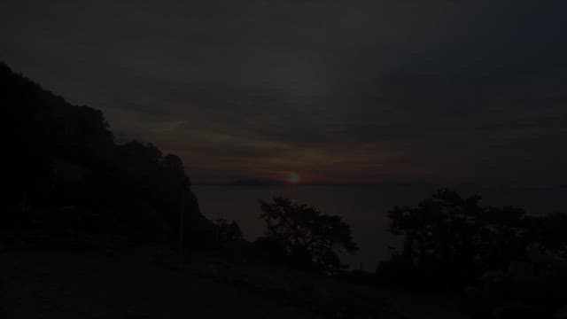 Ocean sunrise view on a tranquil coastal cliff
