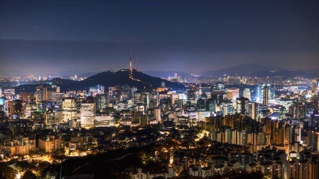 Seoul cityscape changing from night to sunrise