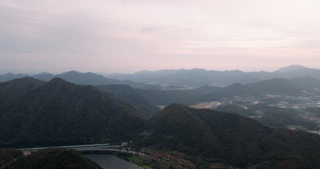 Tranquil Twilight Over Mountainous Landscape