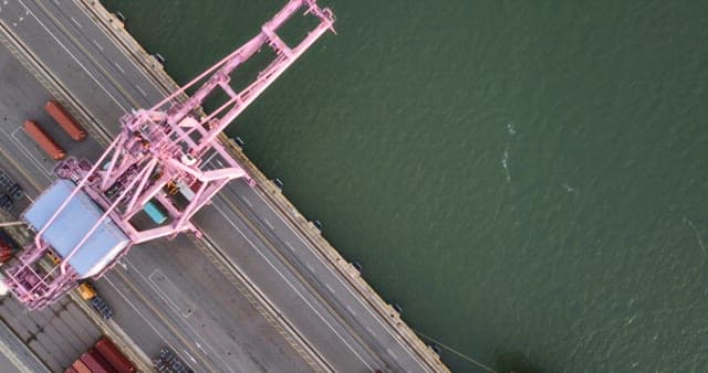 View of a port with cranes and containers