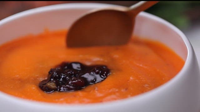 Bowl of steaming carrot porridge