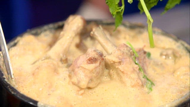 Water parsley added to boiling duck soup