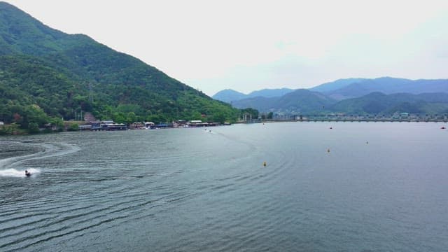 Scenic river surrounded by lush mountains
