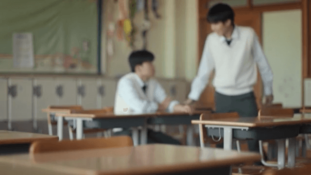 Student Falls Down After Talking with a Friend in Classroom