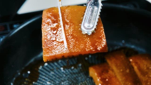 Pork Rind Sizzling in a Pan