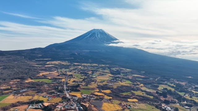 Majestic Mount Fuji with surrounding fields