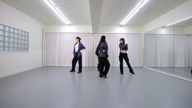 K-POP Dancers Practicing in a Studio