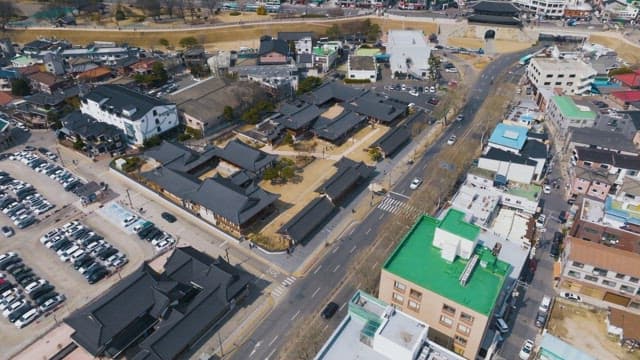 Aerial view of traditional Hanok village and busy road