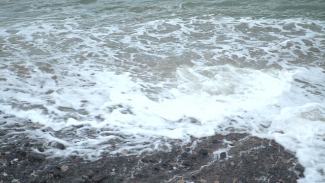 Waves crashing on a rocky shore