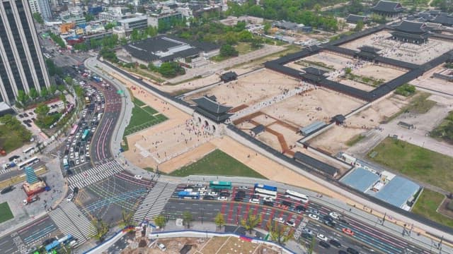 Bustling city with Gyeongbokgung Palace