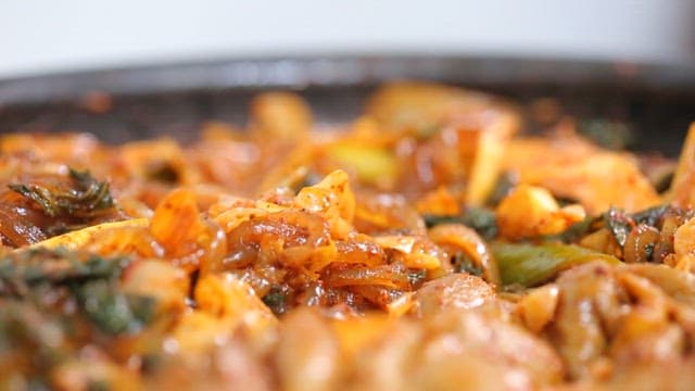 Spicy stir-fried delicious gopchang with vegetables