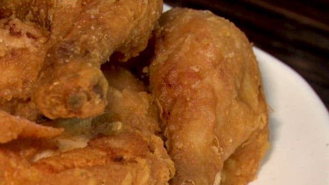 Crispy and golden fried chicken on a plate
