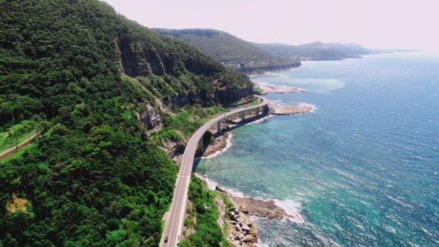 Coastal Highway by the Lush Hillside