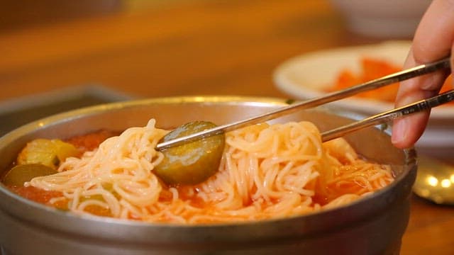 Spoonful of sour and refreshing cucumber noodles