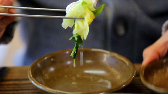 Chicken breast shabu-shabu served with sauce and vegetables
