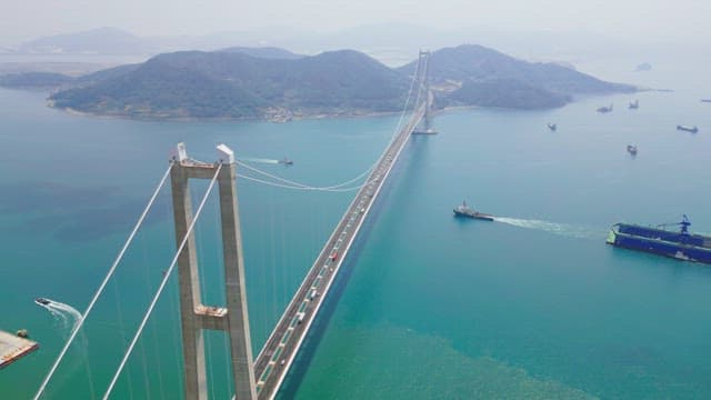 Large suspension bridge over calm sea