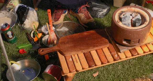 Outdoor Nighttime Squid Preparation by Grill