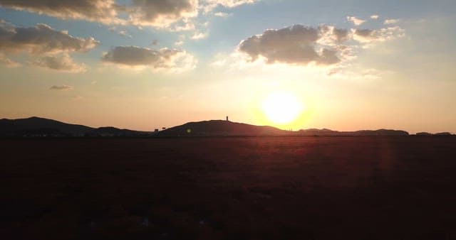 Sunset over a serene landscape