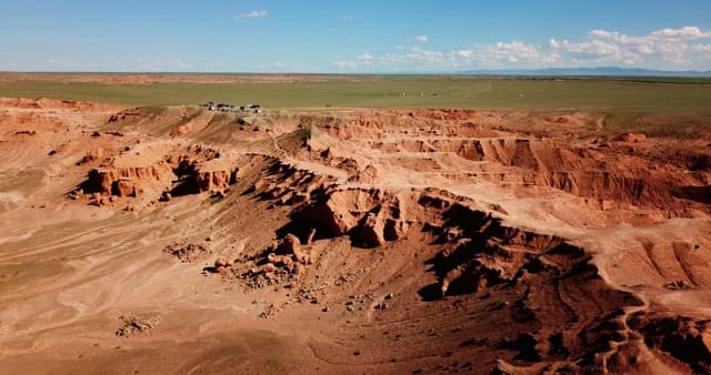 Expansive desert landscape with people