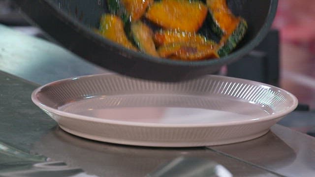 Golden Brown Fried Pumpkin is Served on a Plate