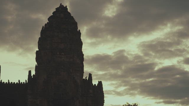 Silhouette of an Ancient Temple Illuminated by Dawn
