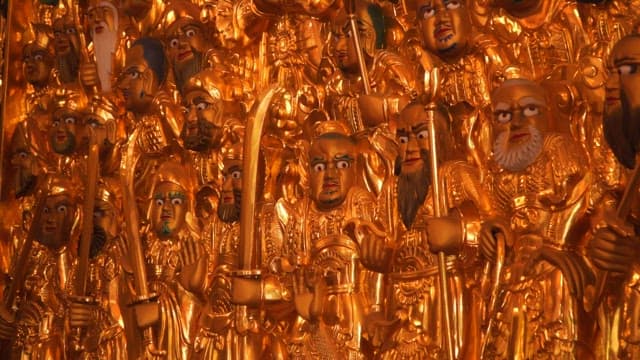 Golden Buddha statues in a temple