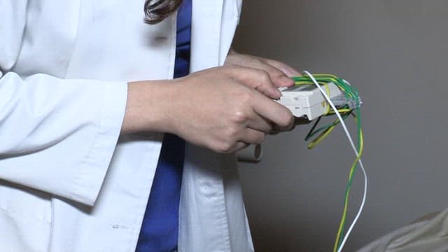 Healthcare Professional Working with Medical Technology