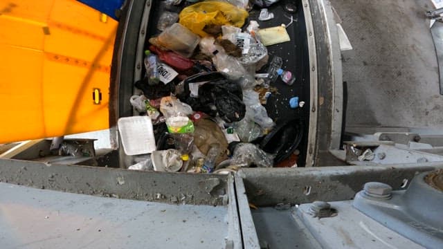 Conveyor belt with mixed waste at recycling center