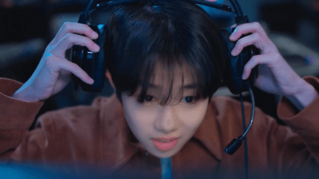 Gamer with headset focused on a screen