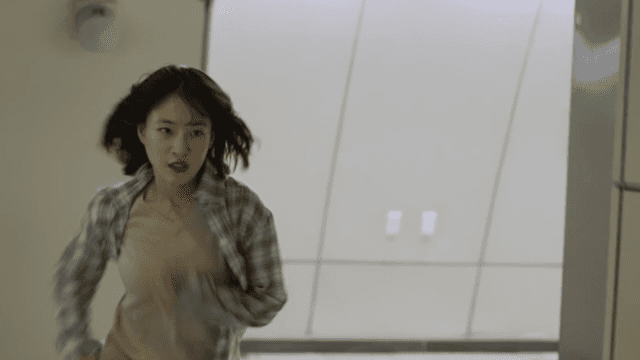 Woman is running intensely inside a subway station