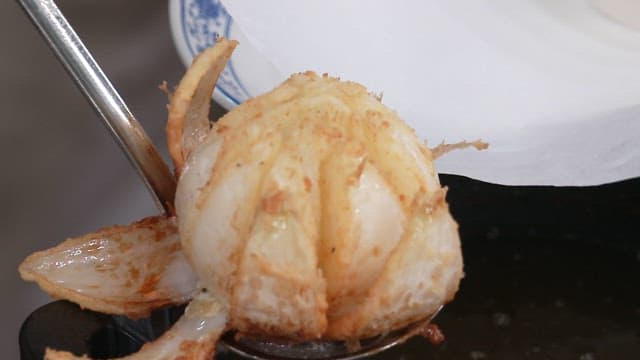 Fried Onion Plated on a Dish with Dipping Sauce