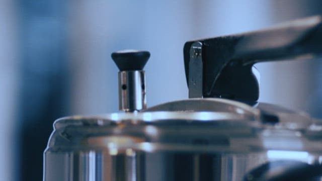 Steaming espresso machine in a cozy setting