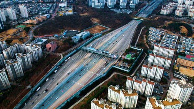 Aerial View of Busy Urban Highway Intersection