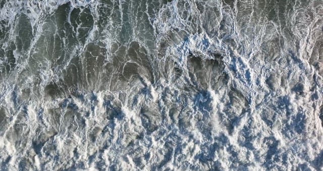 Waves Crashing with Creating White Foam