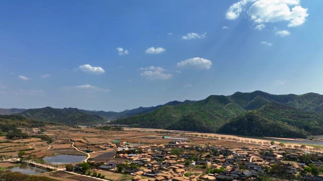 Traditional village surrounded by mountains