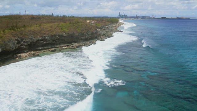 Coastal cliffs with waves crashing