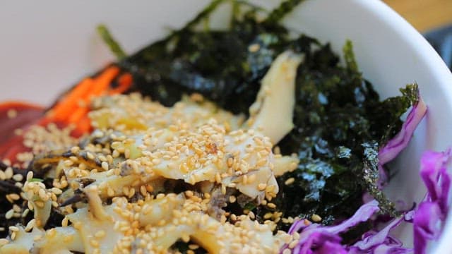 Korean bibimbap with fresh vegetables and abalone