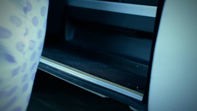 Child Climbing the Steps of a Bus