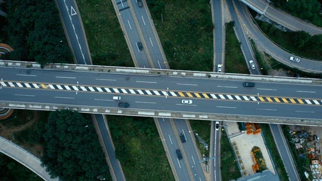 Highways and overpasses with many cars passing by