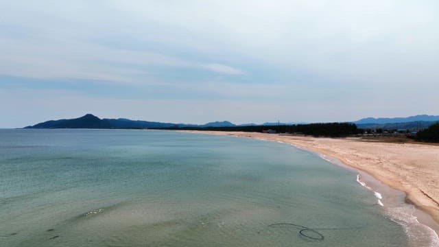 Serene beach with gentle waves