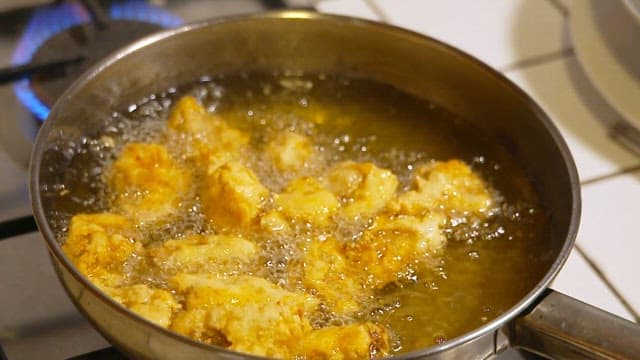 Fish fry in hot oil in a pan